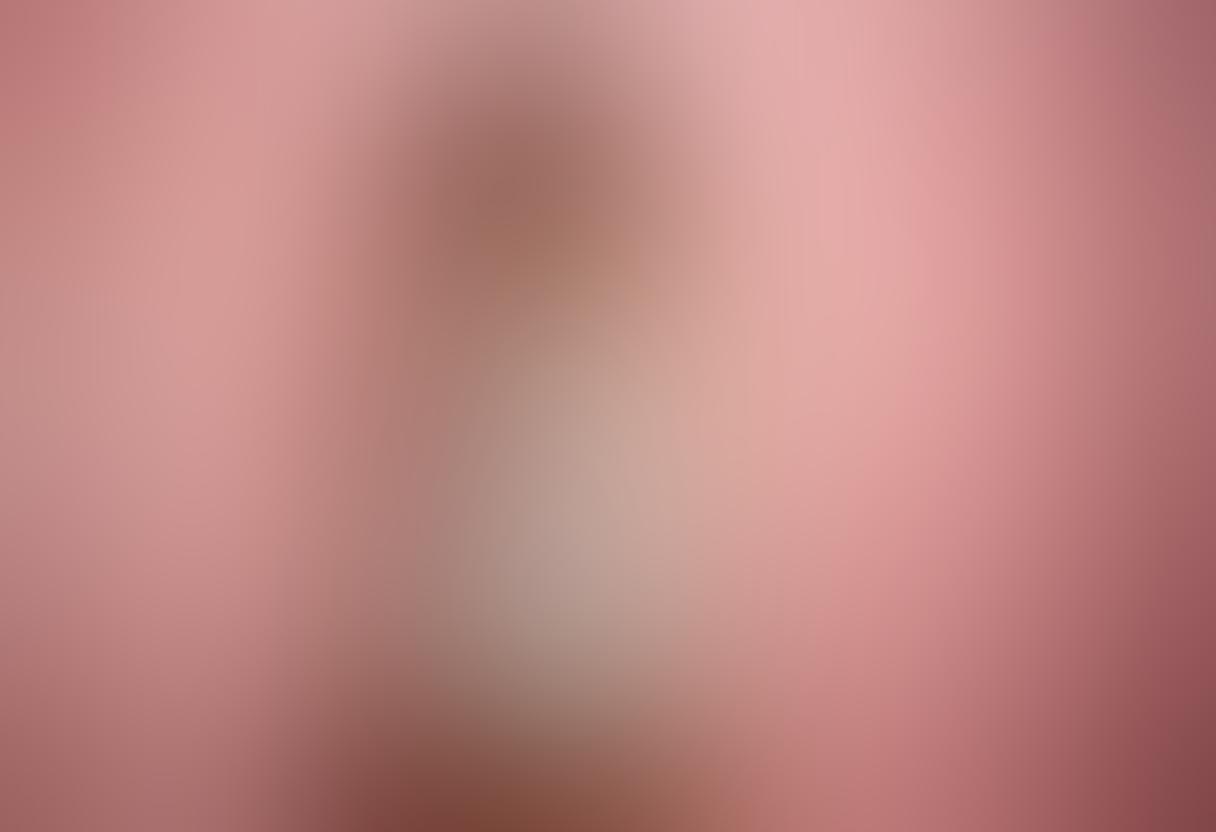 A captivating display of luxurious lingerie ranging from delicate lace to futuristic metallic designs, arranged elegantly on a plush velvet background. The image should depict a spectrum of styles representing different moods: romantic, bold, and robotic, incorporating soft pastel colors alongside striking metallic accents. Include subtle floral patterns intertwining with geometric shapes to symbolize the blend of femininity and modernity. Soft lighting to create a dreamy ambiance. super-realistic. vibrant colors. plush textures.